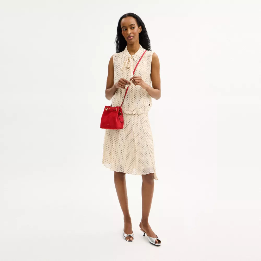 Jade Drawstring Bag - Suede/Brass/Candy Apple