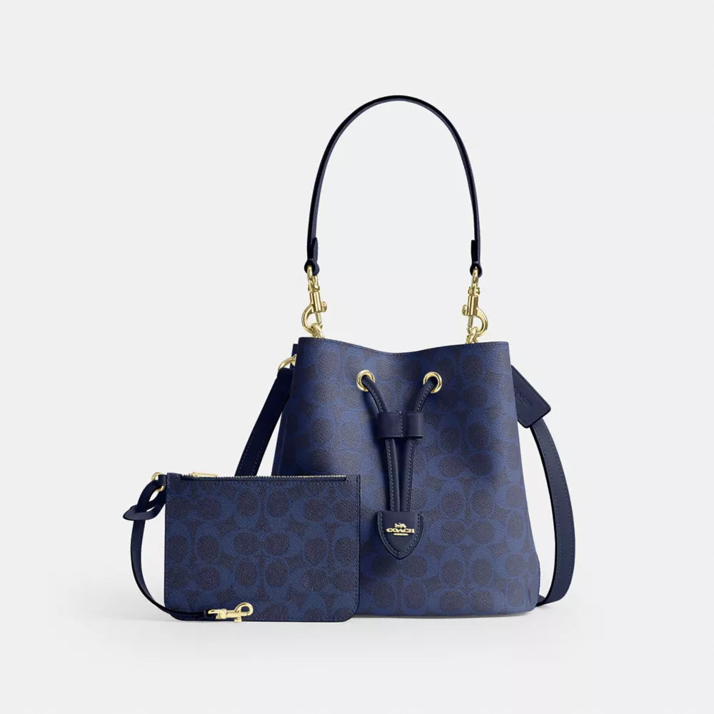 Rowan Bucket Bag In Signature Canvas - Signature Canvas/Gold/Navy