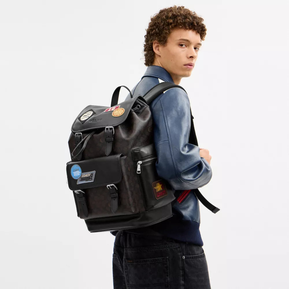 Sprint Backpack In Signature Canvas With Patches - Signature Canvas/SV/Walnut/Black