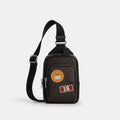Racer Sling Pack In Signature Canvas With Patches - Signature Canvas/SV/Walnut/Black