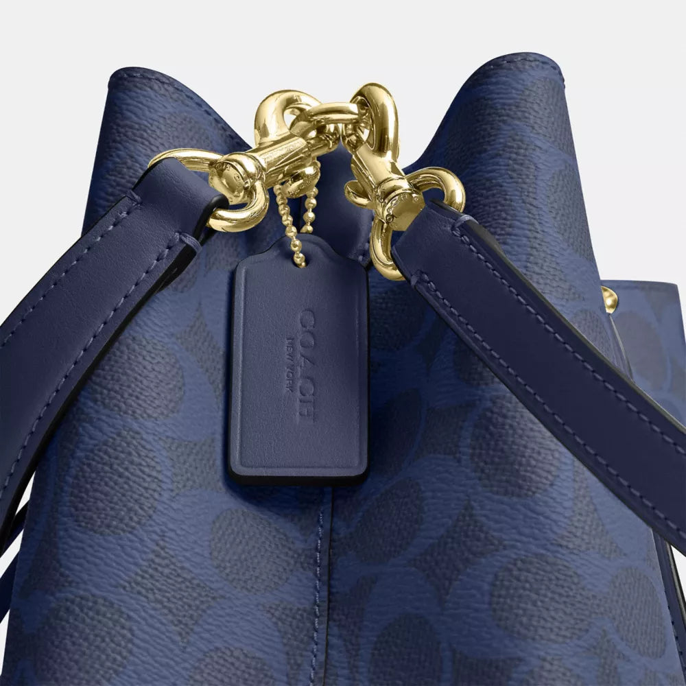 Rowan Bucket Bag In Signature Canvas - Signature Canvas/Gold/Navy