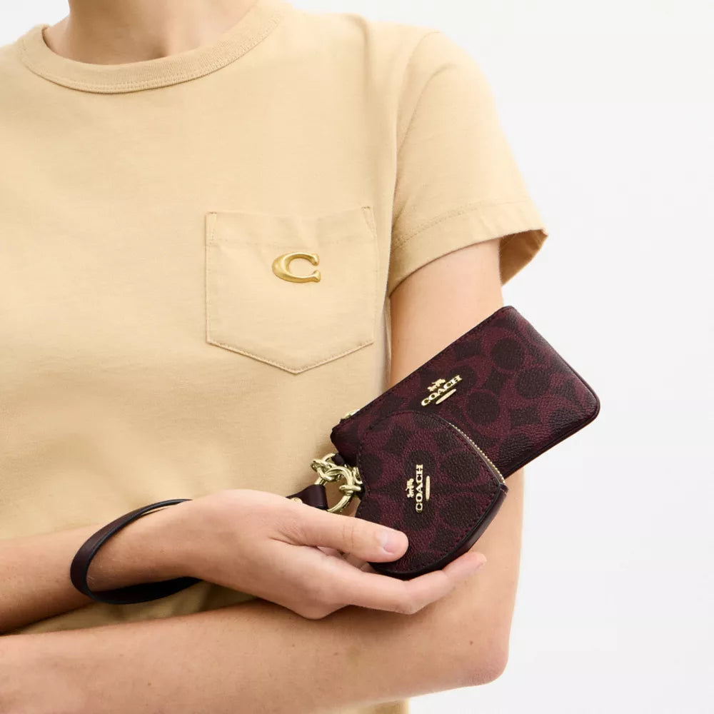 Wristlet And Heart Pouch In Signature Canvas - Signature Canvas/Gold/Black Currant