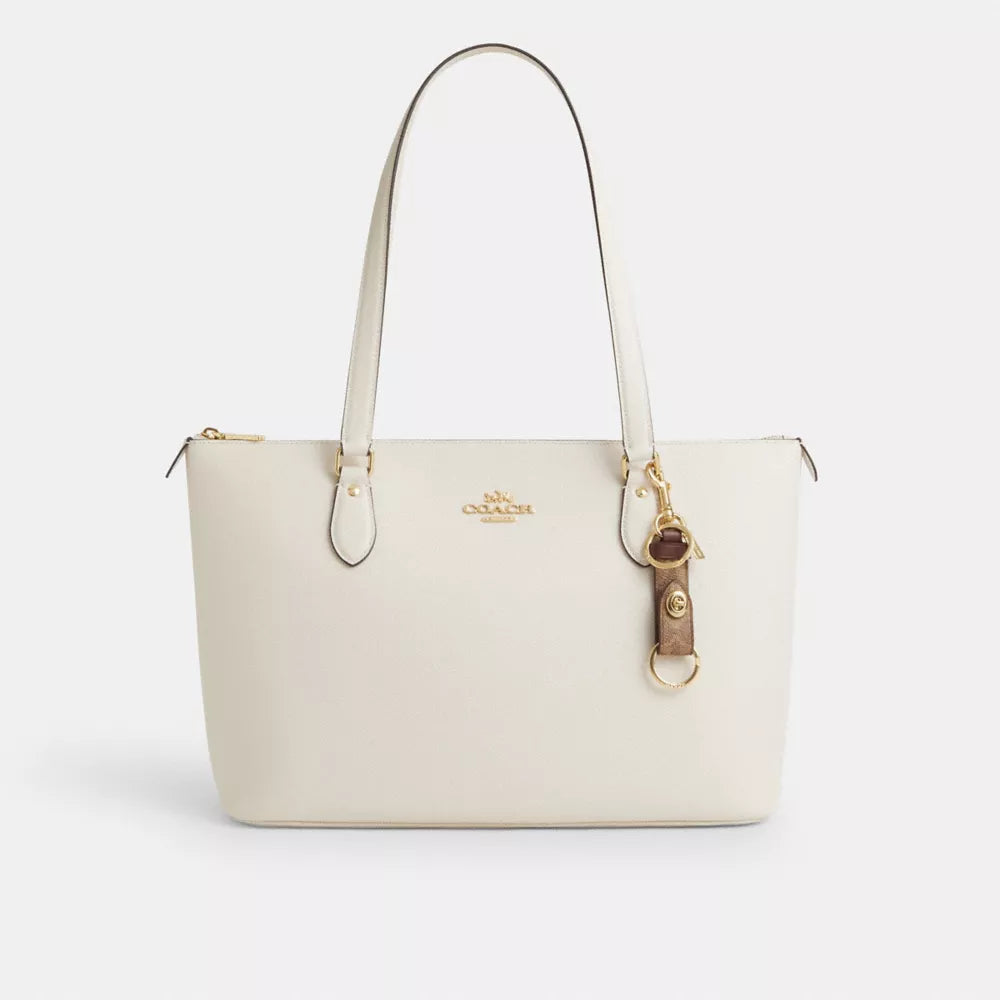 Trigger Snap Bag Charm In Signature Canvas - Gold/Tan/Brown