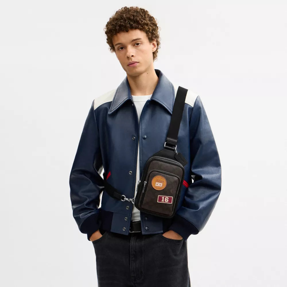 Racer Sling Pack In Signature Canvas With Patches - Signature Canvas/SV/Walnut/Black