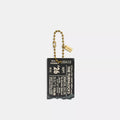 The Turnlocks Concert Ticket Bag Charm - Brass/Black