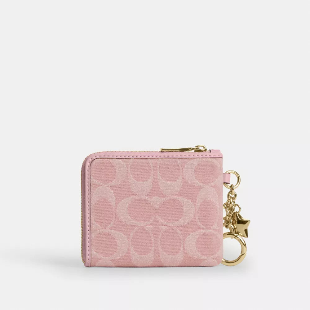 Small Corner Zip Wallet In Signature Denim With Charms - Denim/Gold/Light Pink
