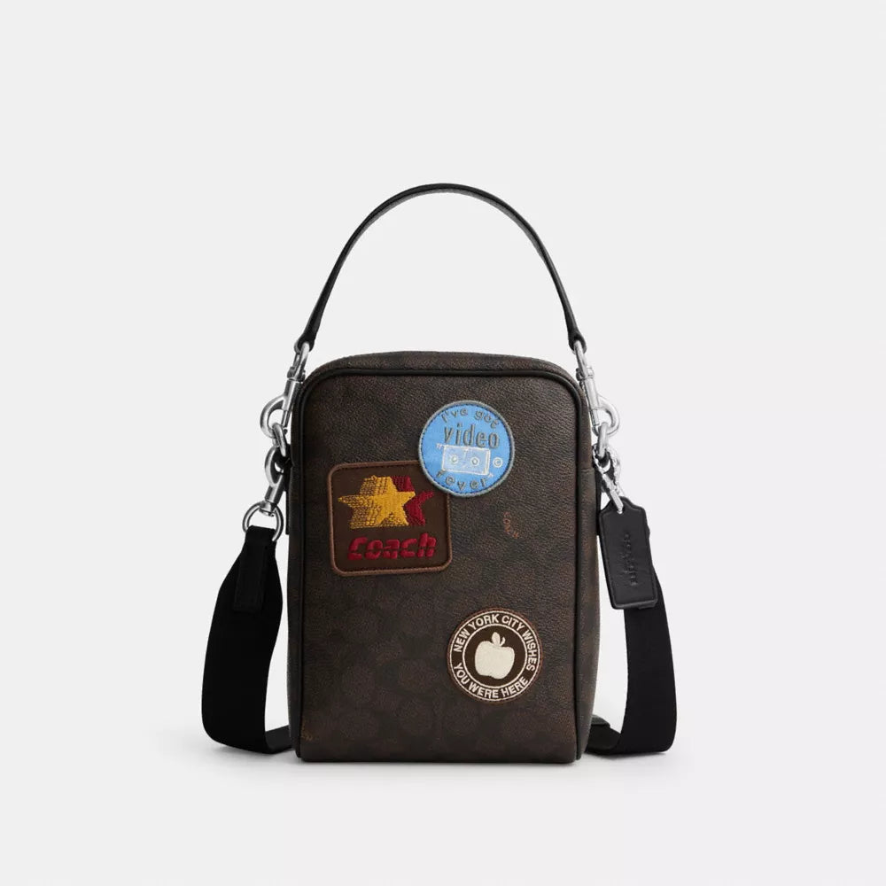 Tristan Crossbody Bag 14 In Signature Canvas With Patches - Signature Canvas/SV/Walnut/Black