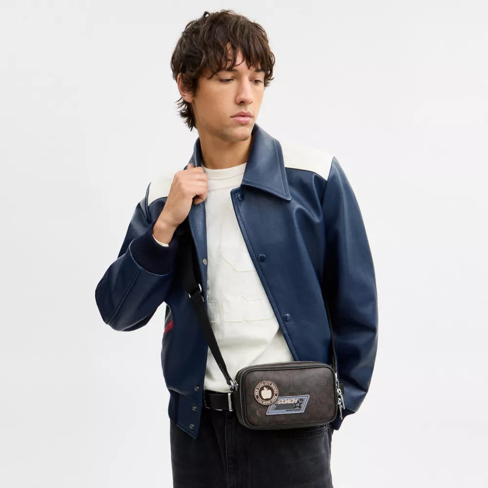 Colton Crossbody Bag 19 In Signature Canvas with Patches - Signature Canvas/SV/Walnut/Black
