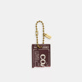 Live In Concert Concert Ticket Bag Charm - Brass/Merlot