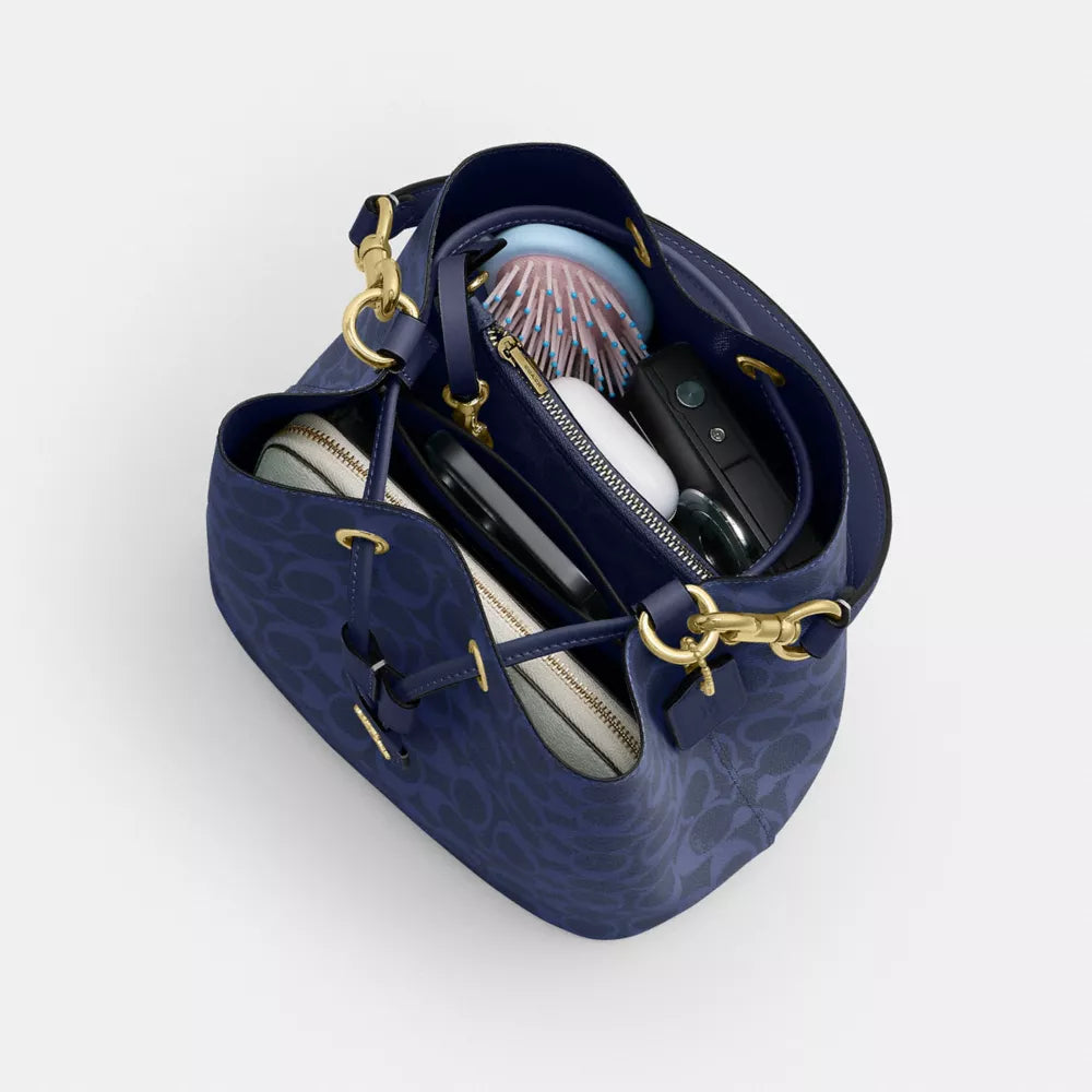 Rowan Bucket Bag In Signature Canvas - Signature Canvas/Gold/Navy