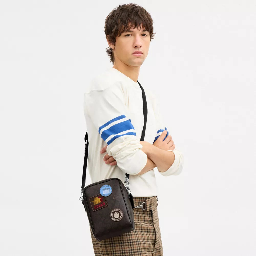 Tristan Crossbody Bag 14 In Signature Canvas With Patches - Signature Canvas/SV/Walnut/Black
