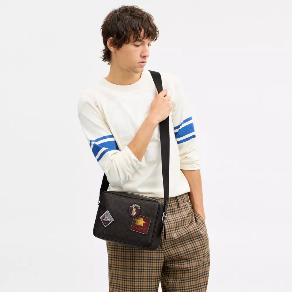 Colton Crossbody Bag 25 In Signature Canvas With Patches - Signature Canvas/SV/Walnut/Black
