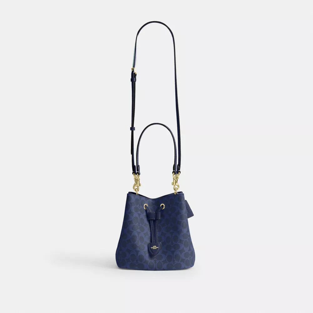 Rowan Bucket Bag In Signature Canvas - Signature Canvas/Gold/Navy