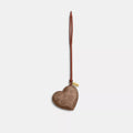 Heart Puffy Bag Charm In Signature Canvas - Brass/Tan Caramel