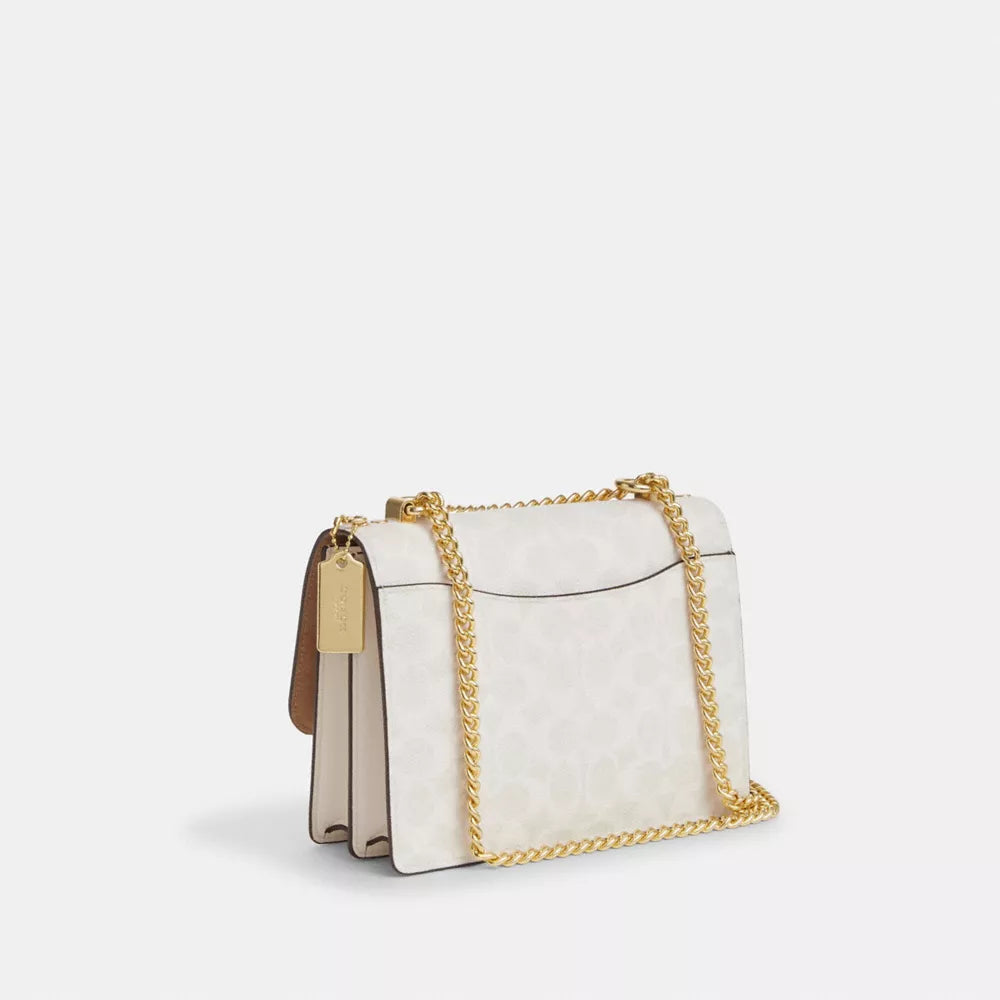 Klare Crossbody Bag In Signature Canvas - Signature Canvas/Gold/White/Chalk