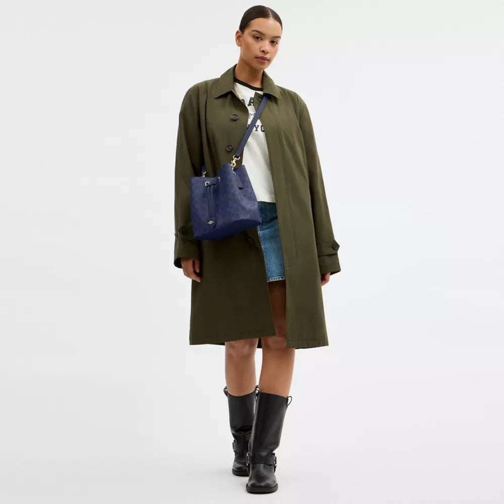 Rowan Bucket Bag In Signature Canvas - Signature Canvas/Gold/Navy