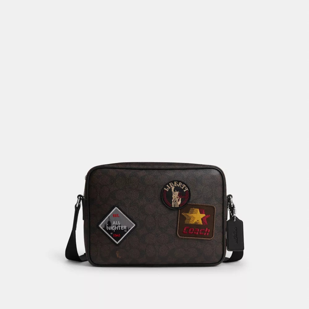 Colton Crossbody Bag 25 In Signature Canvas With Patches - Signature Canvas/SV/Walnut/Black